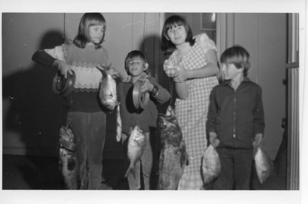 The Ross family with Mum's catch, early 1970s