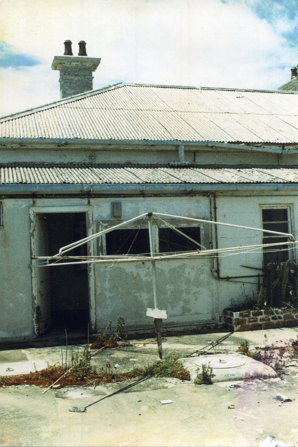 The Lightkeepers' cottages on South Solitary Island before restoration, c.1975