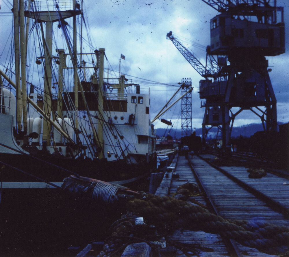 SS Kuranda being loaded at Coffs Harbour Jetty by crane, 1959 - 1960