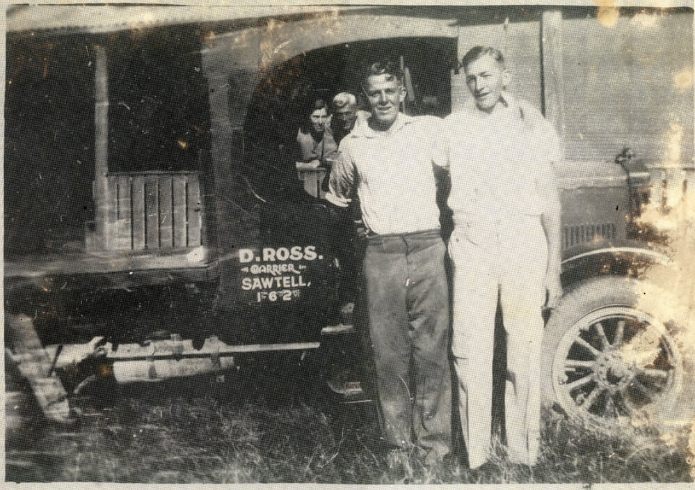 Sawtell carrier David Ross and friends with his Overland Crosley truck, late 1934