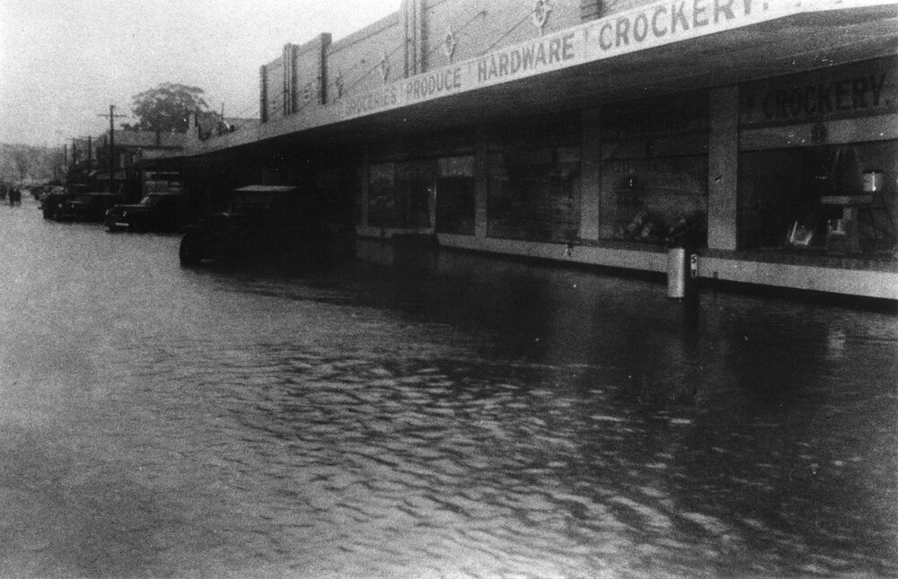 Moonee Street near its junction with High Street after a cyclone, June 1950
