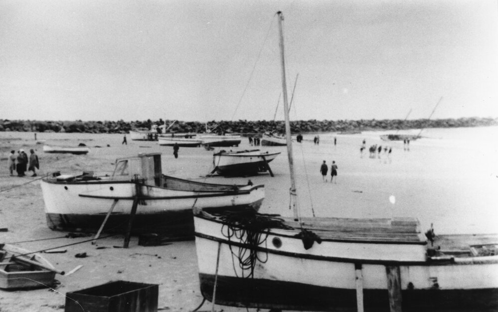 Wild weather drove small craft in the harbour ashore, August 1949