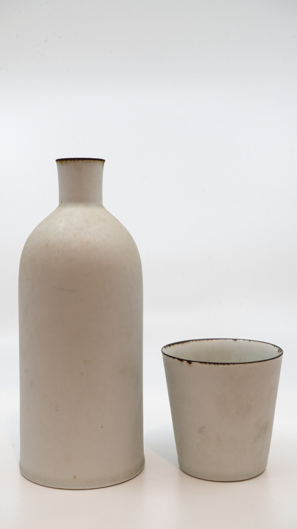 Medicine bottle and cup