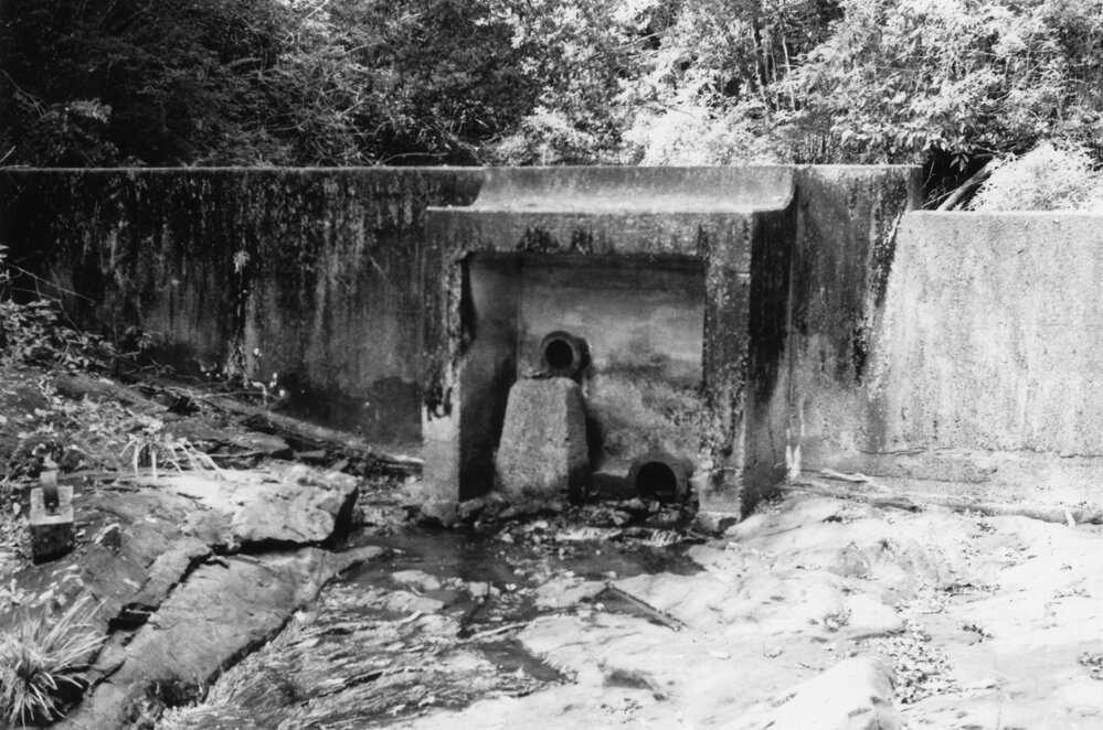 The pipe head weir on Friday Creek, early 1990s