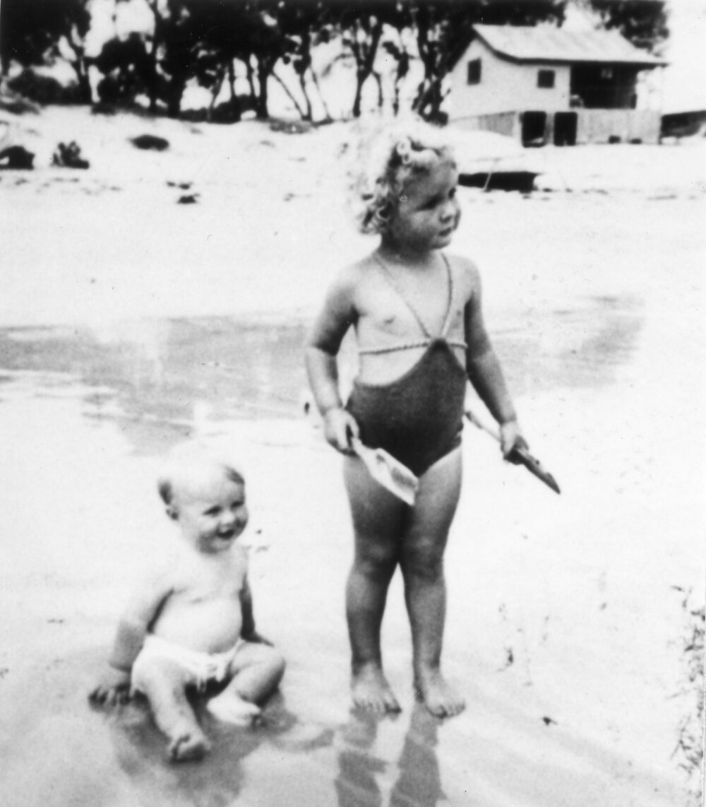 Allen and Merilyn Brown playing on the beach, Woolgoolga, 1939
