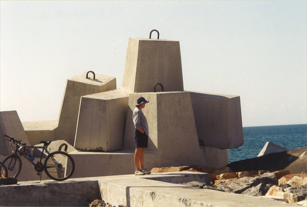 Person standing at South Breakwall, Coffs Harbour