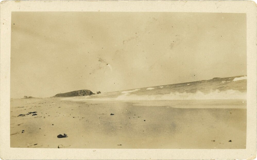 View of beach and rock, possibly Flat Top Point