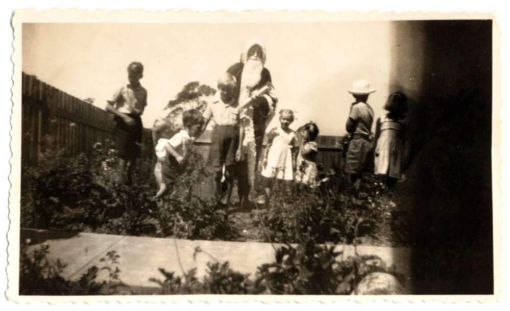 Photograph of children with Santa Claus
