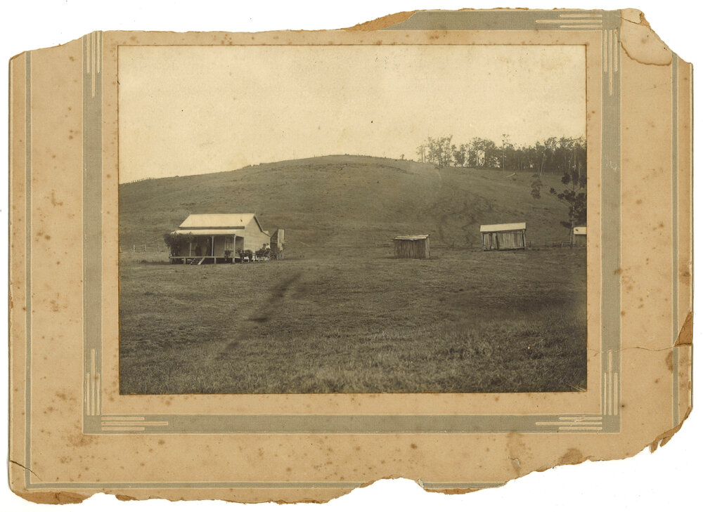 View of house and sheds in rural setting, 1917