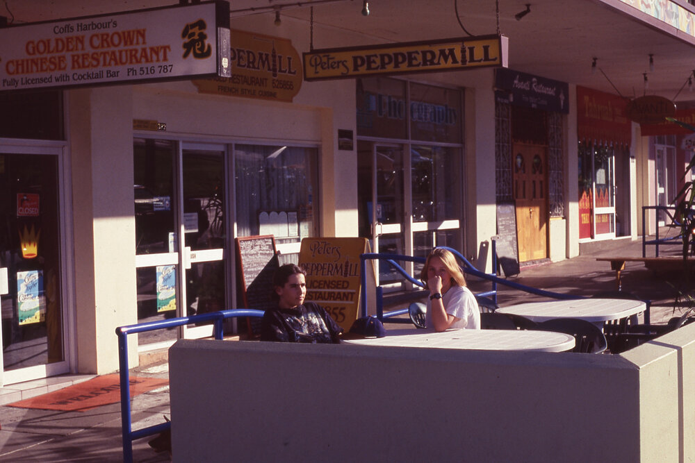 Students sitting at the Jetty Strip