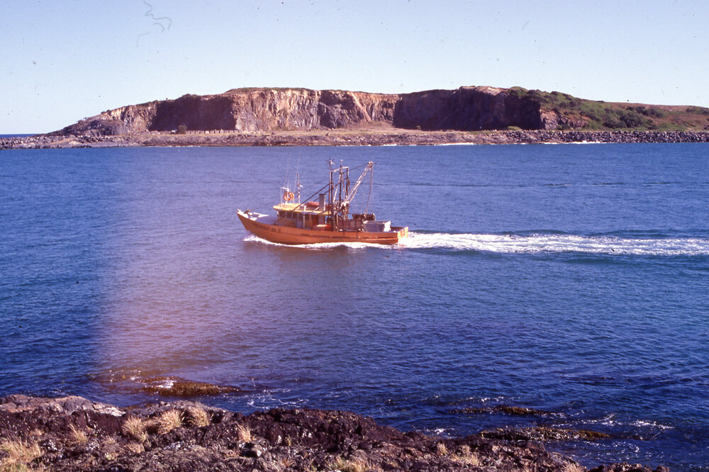 Fishing boat leaving the harbour
