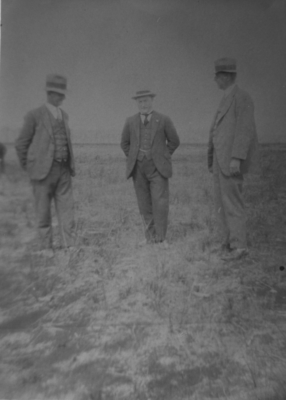 Charles Vost, Bill Cox and R. H. Bartlett inspect the Aerodrome airstrip, c. 1930