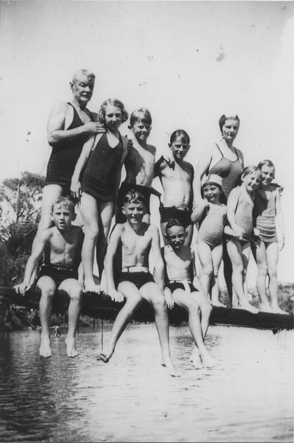 James Smith with his daughter and children at their swim class in Coffs Creek, 1938 