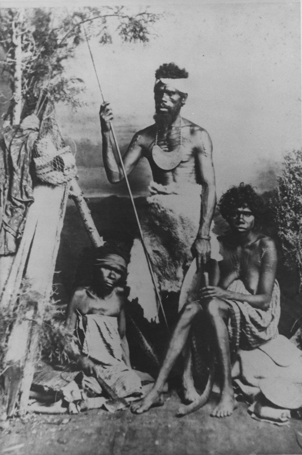 Portrait of three Aboriginal Australians from the Clarence River in a studio setting, 1875