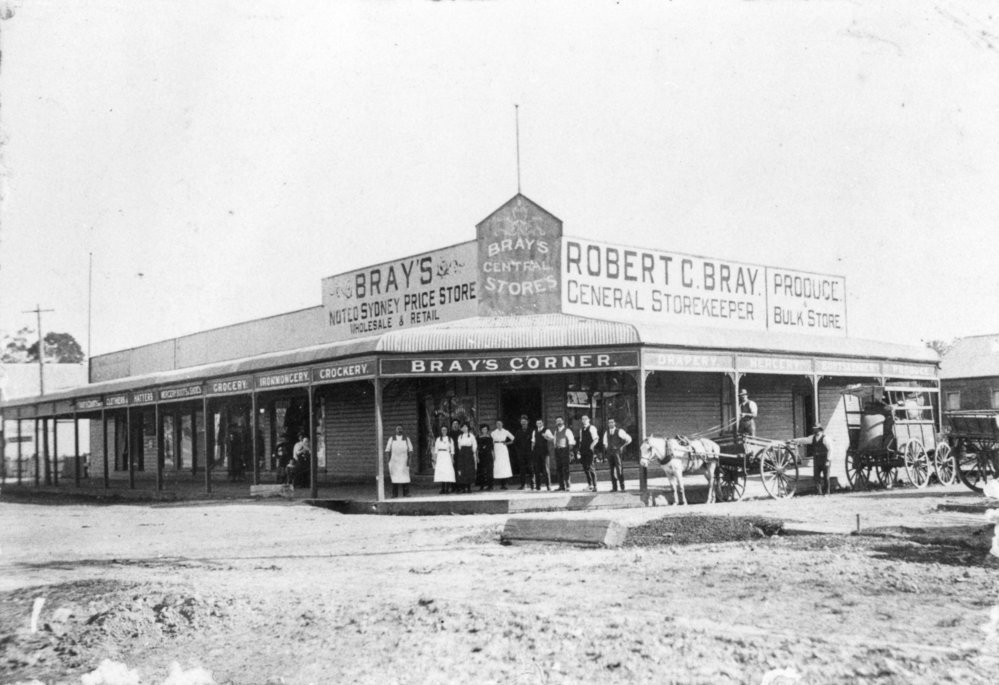 Staff in front of Robert Bray's Central Store, 1908