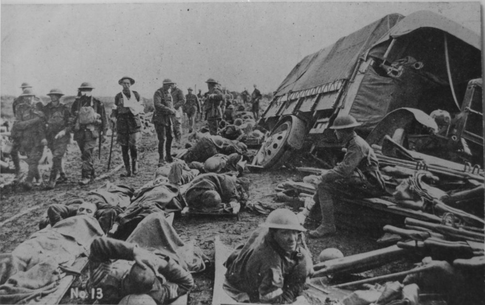 Wounded soldiers near a damaged military vehicle, 1917