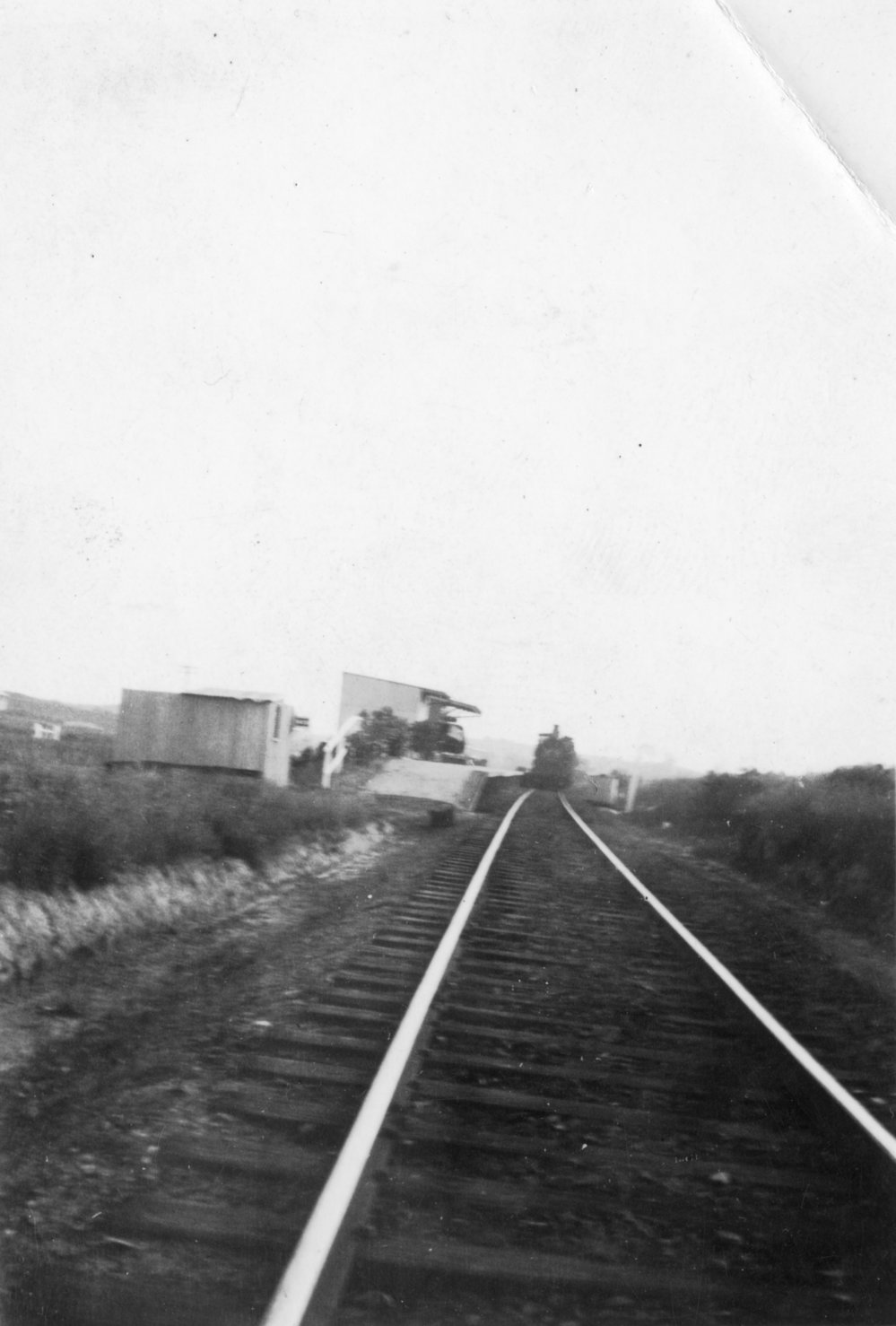 A steam train pulling into Sawtell Railway Station, c. 1940