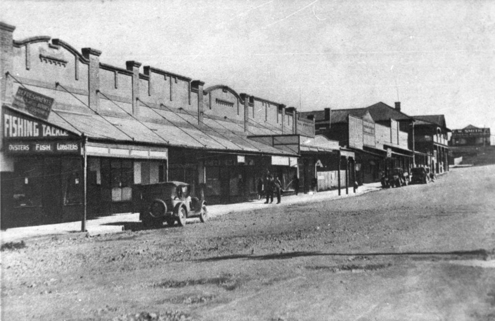 Shops along the Jetty town strip, c.1920