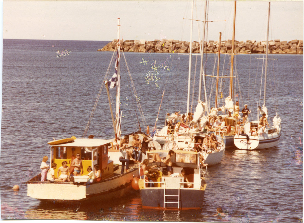 Six sailing boats with passengers moored in the harbour, 4 September