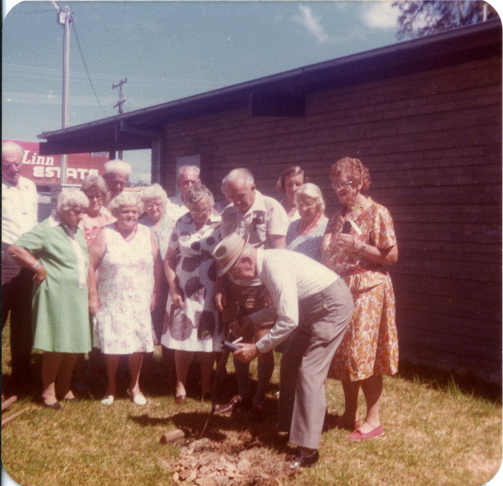 Mr Potts planting a gum tree at Coffs Harbour Regional Museum, c.1988