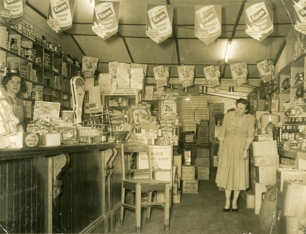 Edna Bray and Del Berriman inside Bray's Store, 1956 