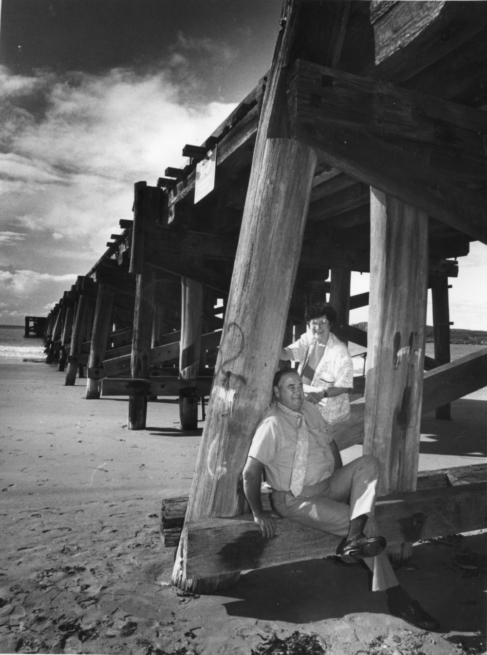 Councillors Brian Beckett and Heather Casson sitting on a jetty footing, 1992