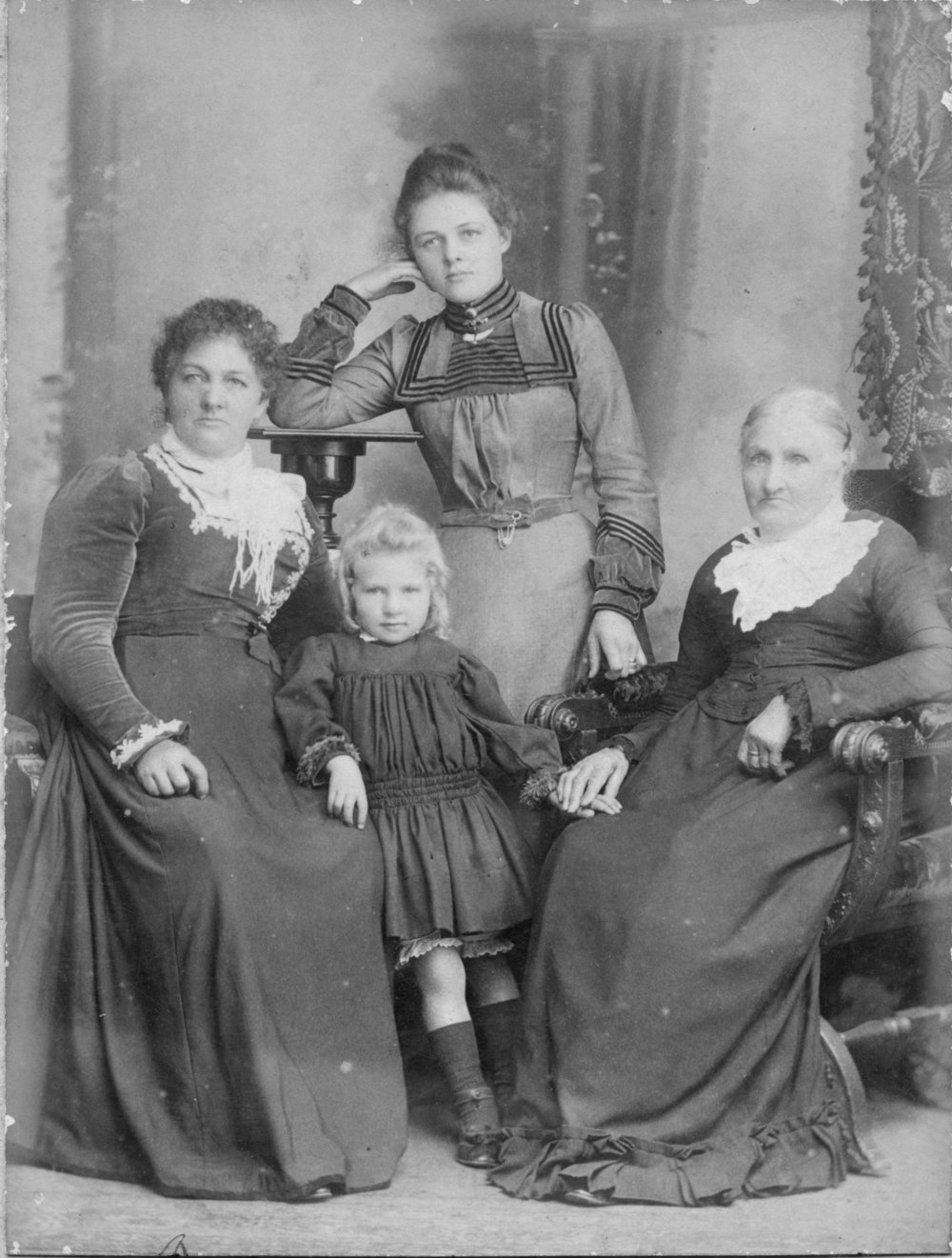 Portrait of three generations of the Carrall family, 1903 