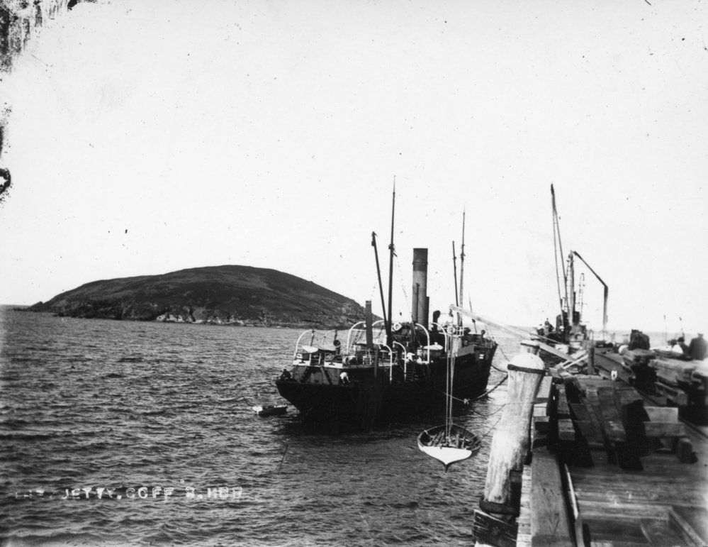 SS St George berthing with a rowing boat taking cable to a buoy, 1904