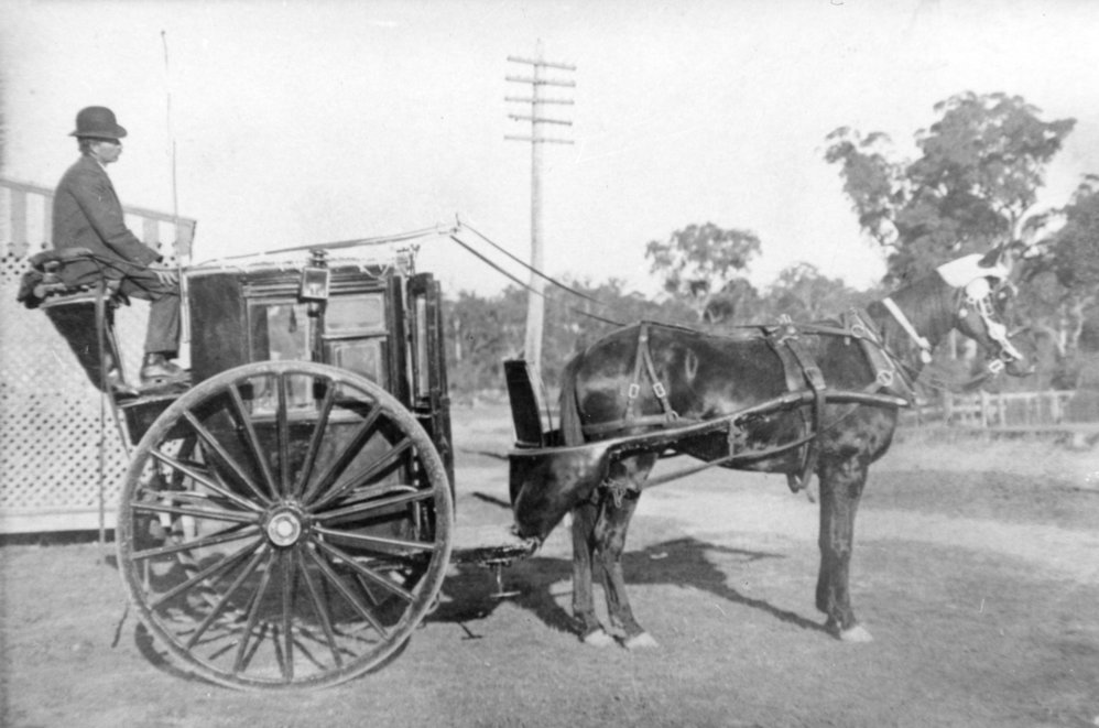 Joe J. Smith and horse-drawn Hansom Cab, 1911