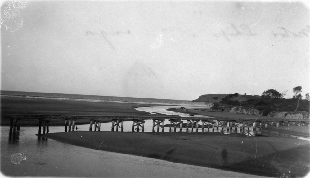 The B.A.T. tramway bridge over Coffs Creek at low tide, 1931 