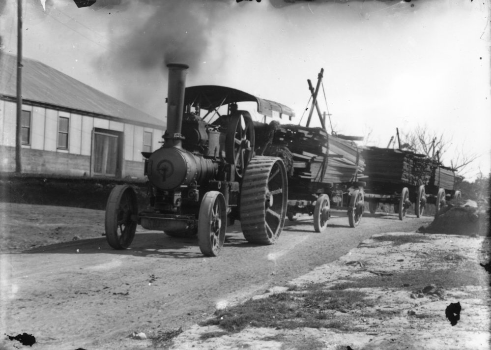 Harry Fraser and George King with their traction engine, c.1910