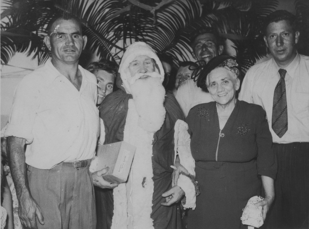 The Bray and Spagnolo families celebrate Christmas, December 1953 
