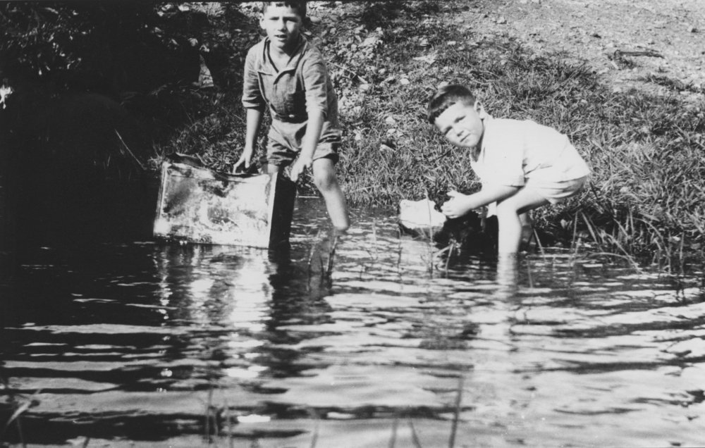 Harlie and Ian Eckford at play in the creek, March 1929