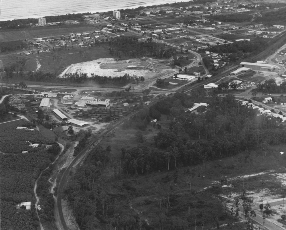 Allen Taylor's sawmill with Park Beach Plaza in an early construction stage, 6 March 1979