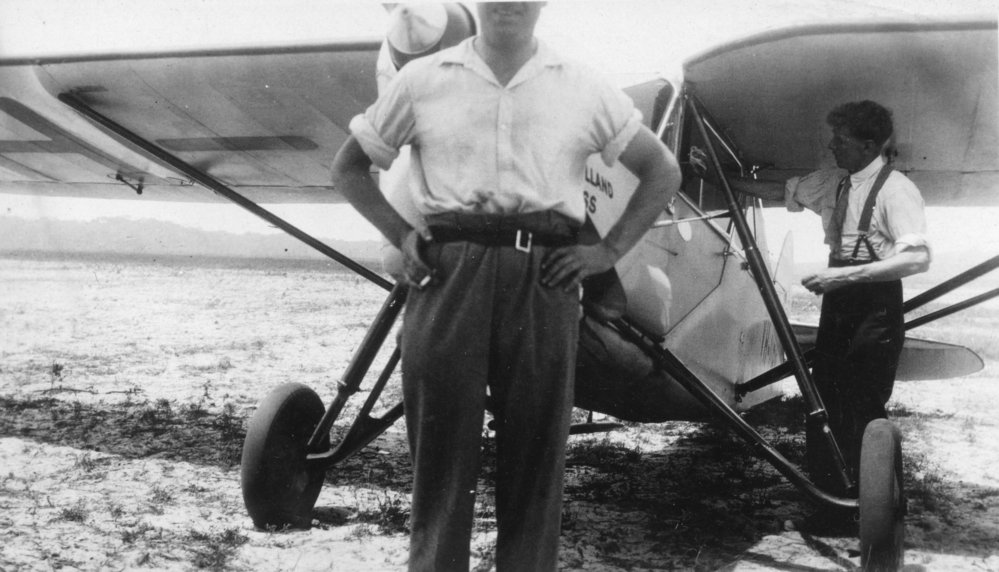 Major De Havilland and a DH 80A Puss Moth aeroplane, 1931