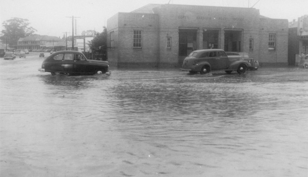 Flooded streets surround the Post Office, Coffs Harbour, June 1951 