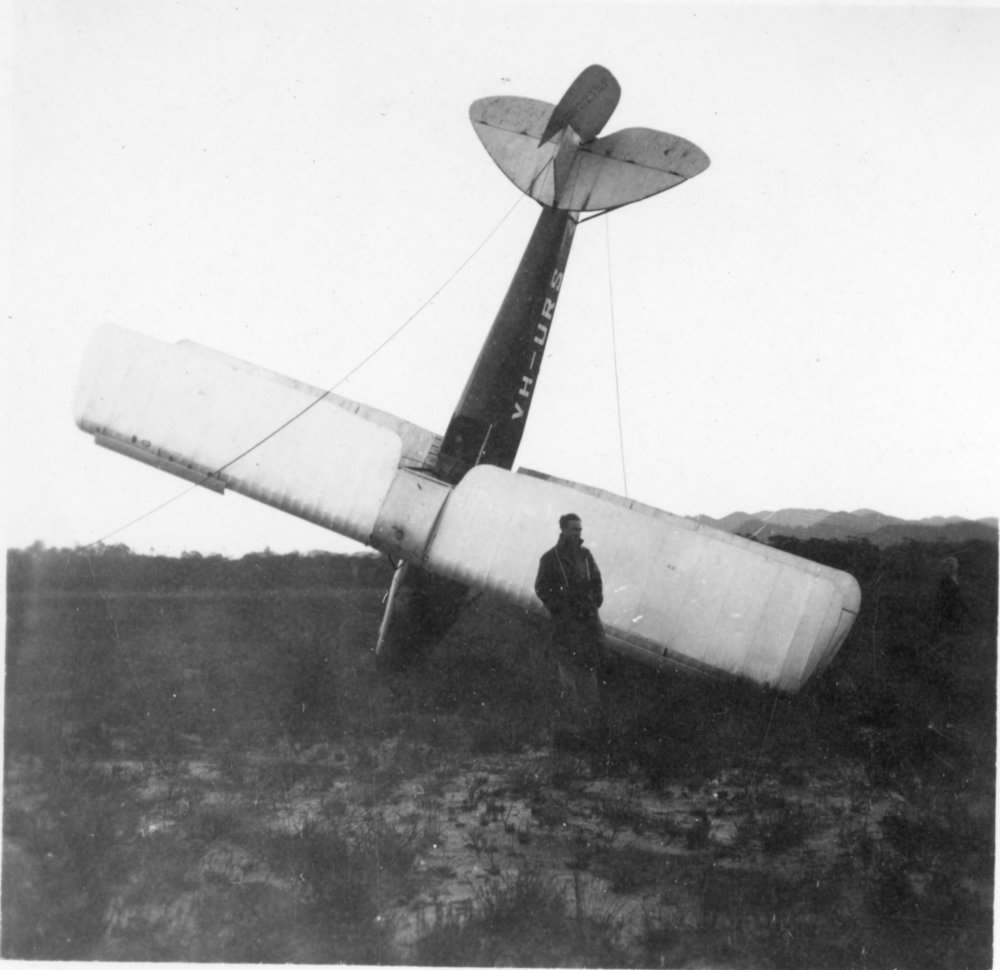 Aero Club member Eric Pidgeon with his crashed DH 60 Moth VH-URS, 7 June 1939 