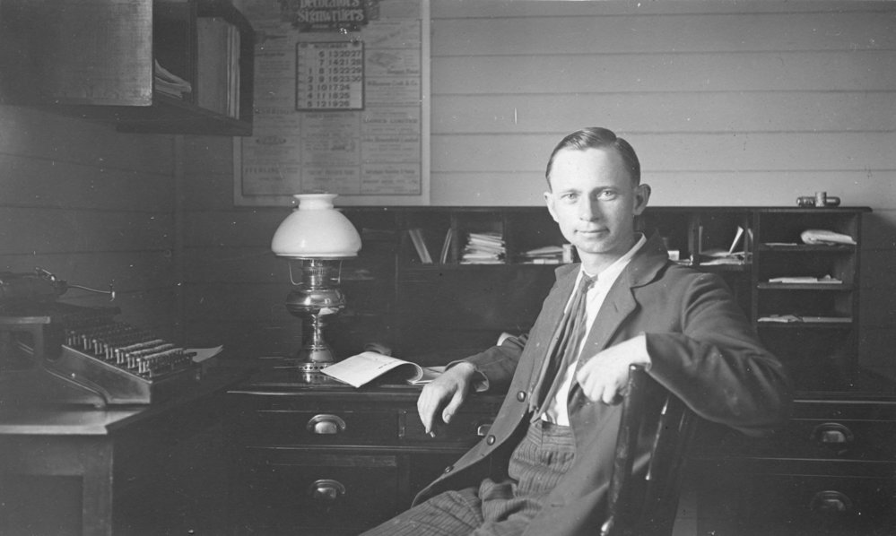 Peter Jensen self portrait at his desk, 1921 