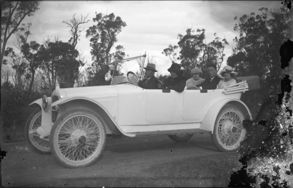 Stanley Nelson and family in his convertible motor vehicle, c. 1922