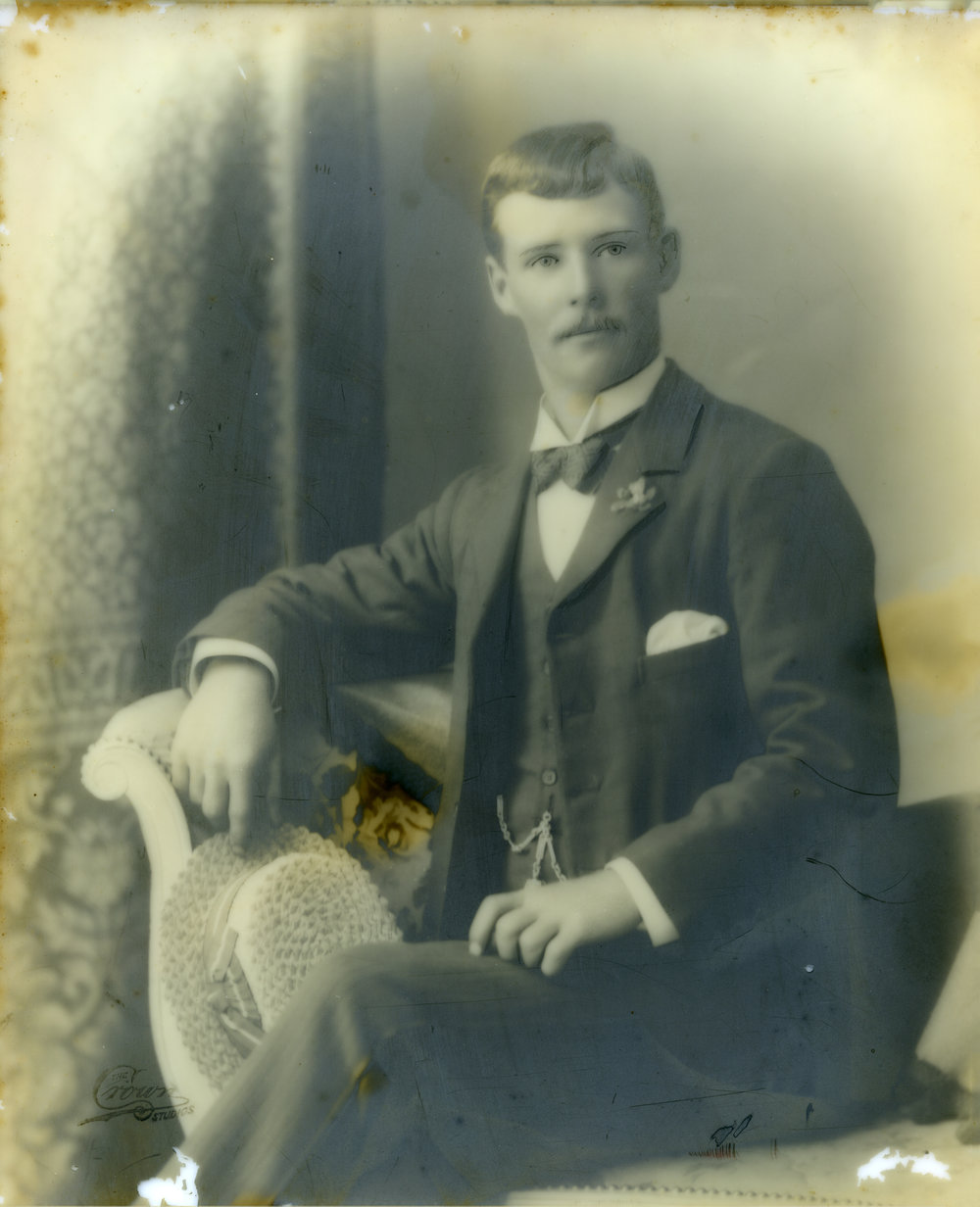 Portrait of a man with a straw boater hat, c. 1905