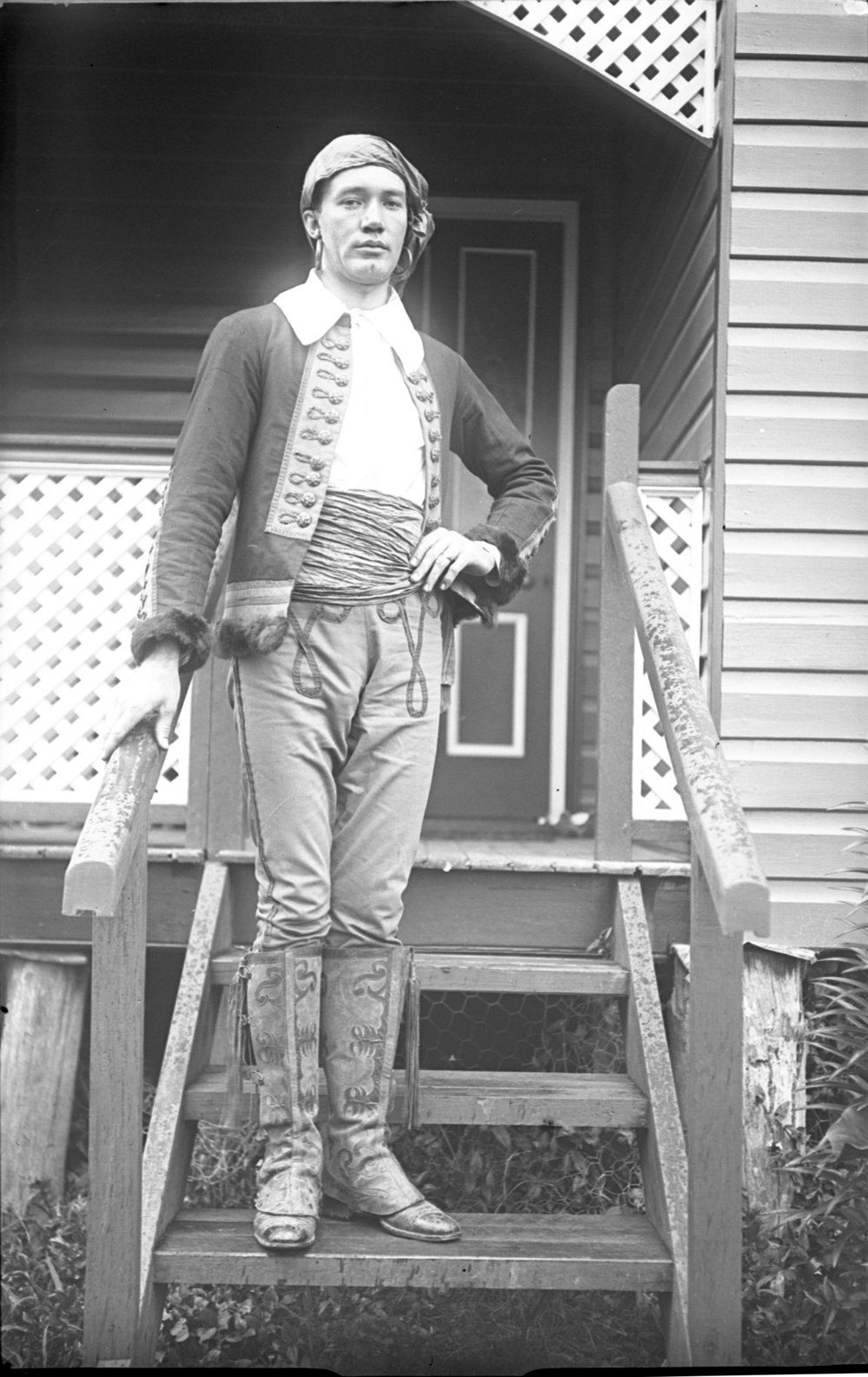 Business portrait of Mr. Reuben Scrivener in gypsy costume, 5 October 1924