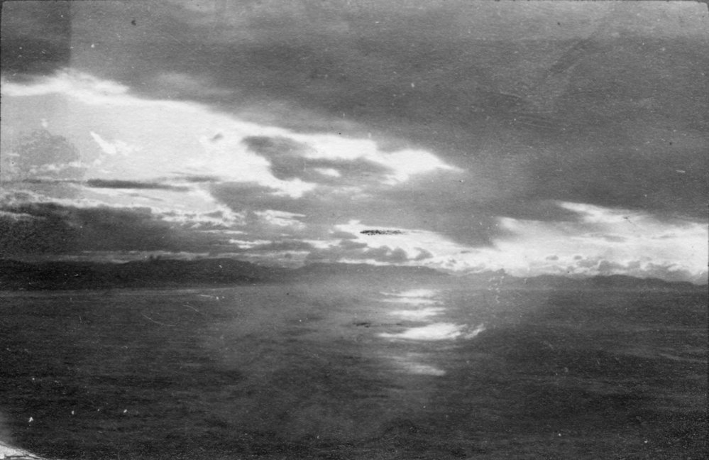 A sunset over breaking surf, c.1912