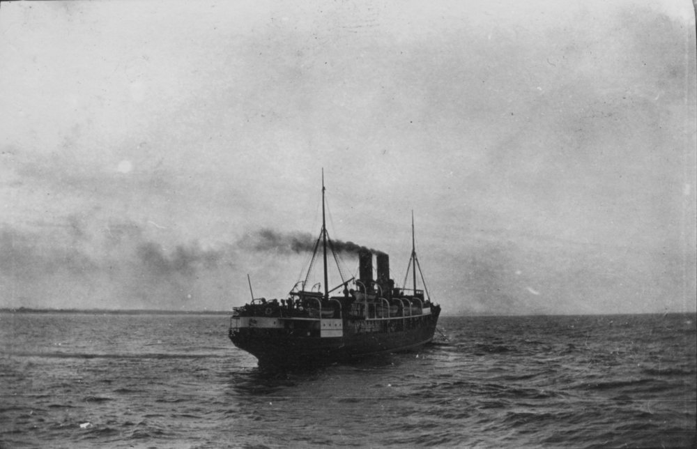 A passenger ship steams away from Byron Bay, c.1912