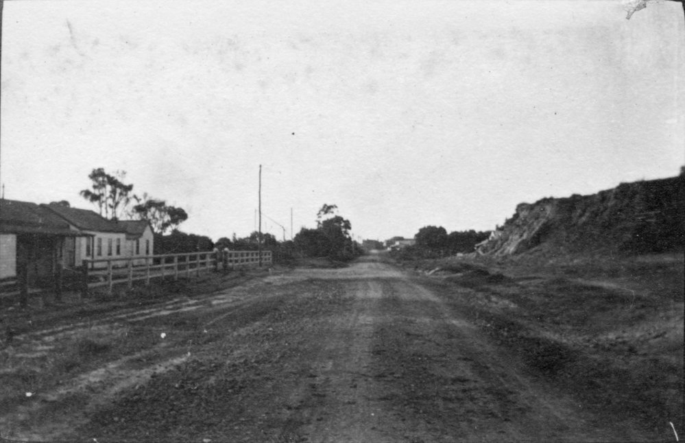 An unsealed road in front of the Butter Factory at Byron Bay, c.1912