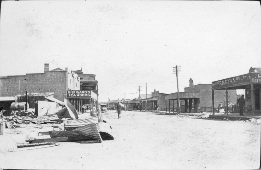 Remnants of a building fire in the main street of Byron Bay, c.1912