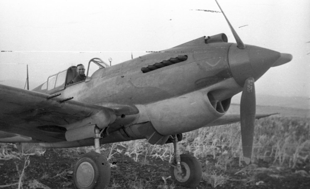 A pilot in the cockpit of an RAAF Tomahawk Boomerang fighter, c.1942 