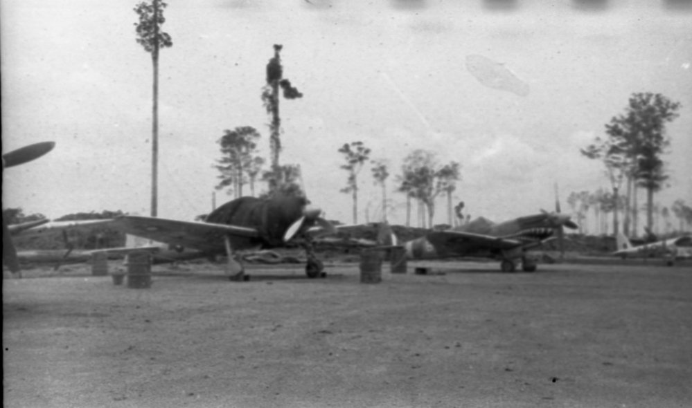 Fighter planes at airstrip, 1945