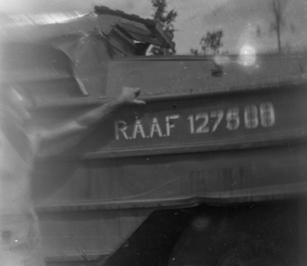 Soldier with R.A.A.F. army duck 127569, 1945