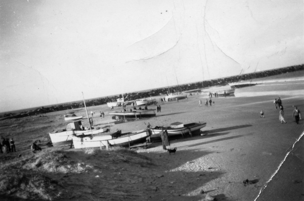 Fishing boats washed up on Jetty Beach after a cyclone, June 1950