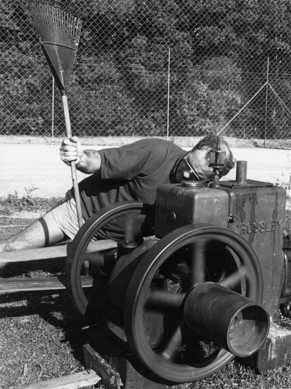 Doug Hoschke demonstrates how to use a corn cracker at the Orara Valley Fair, 10 June 1992 